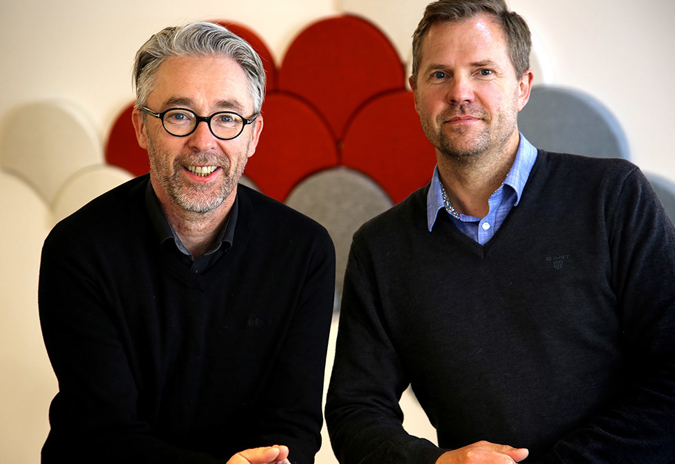 Robert Isaksen (t.v.) og Børge Lotre gleder seg over nytt publiseringssystem. (Foto: Norges sjømatråd)